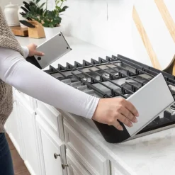 Baby Gates + Babyproofing-QDos Adhesive Stove Guard